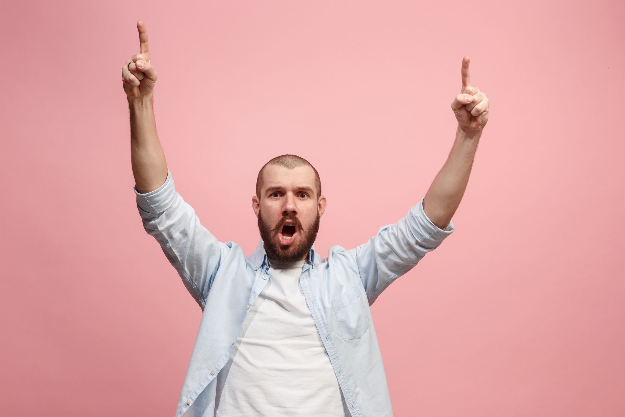 Beautiful Bride in White Dress and Groom in Stylish Black Suit Celebrate Wedding at an Evening Reception Party. Newlyweds Dancing at a Venue with Best Multiethnic Diverse Friends.