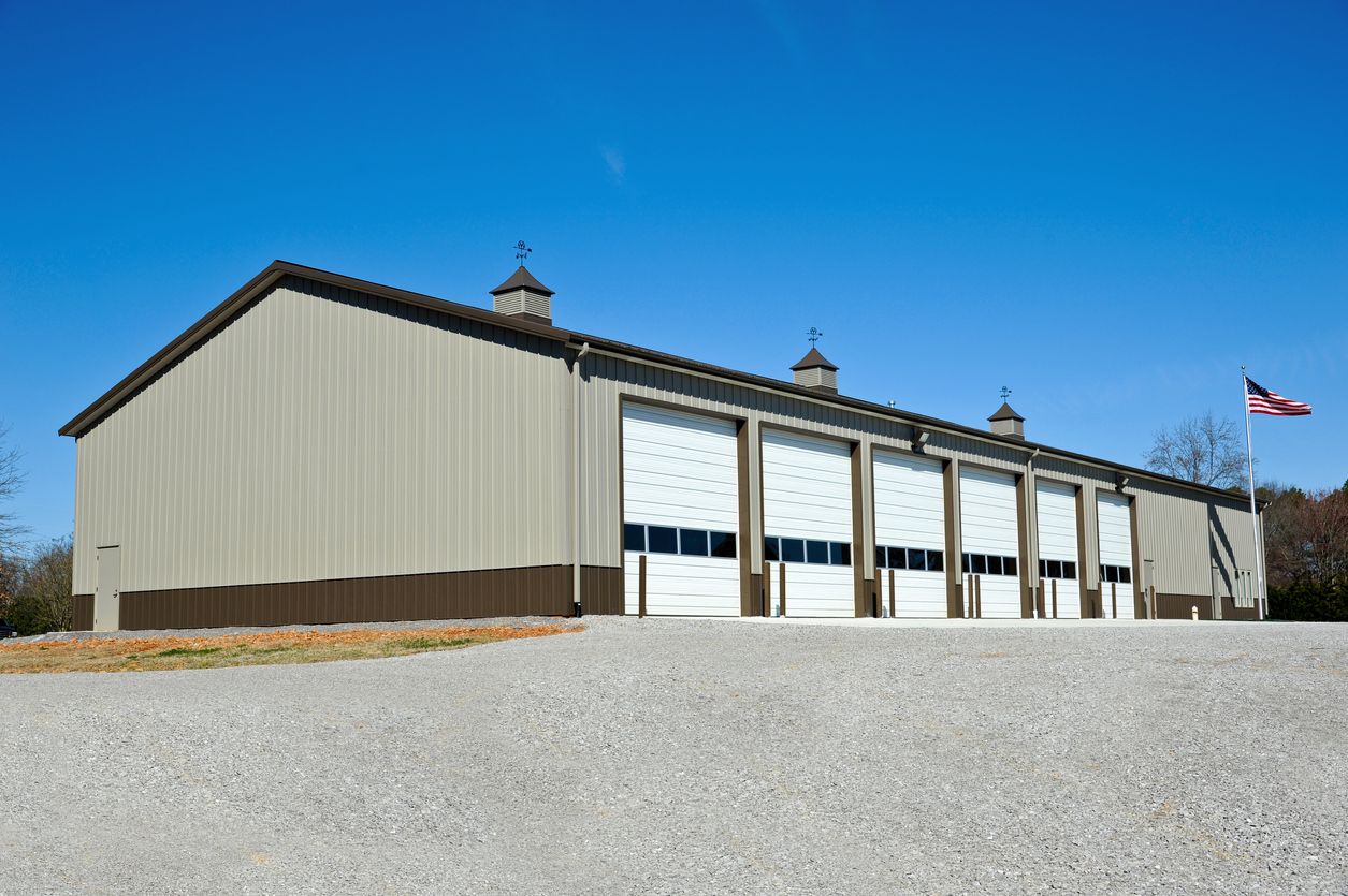 commercial building with multiple garage doors