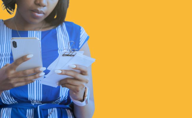 African American woman using smartphone for online financial payment